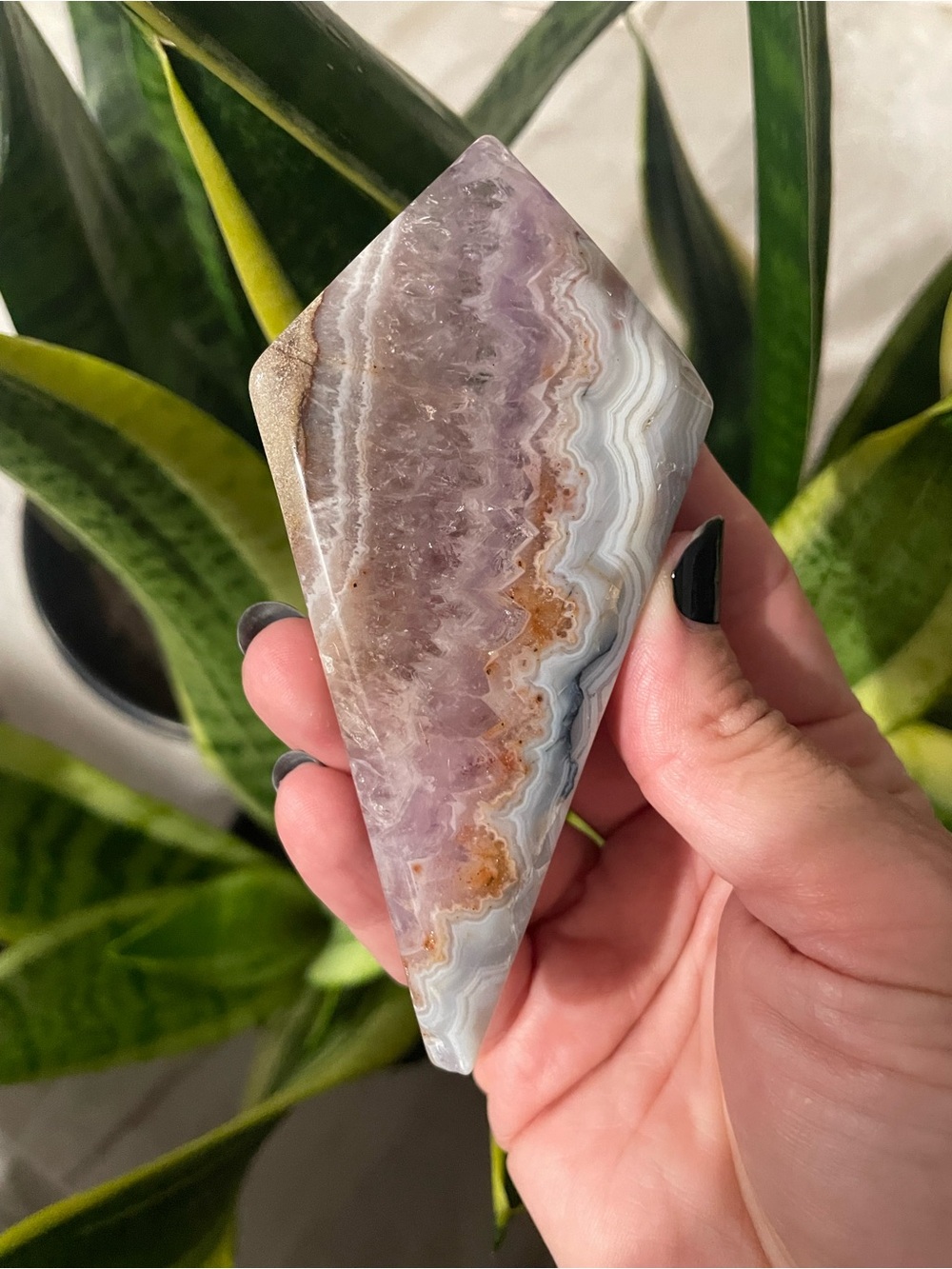 Crazy lace with amethyst kite or rhombus polished crystal.
